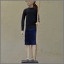 [thumbnail of Carved wooden figure with fabric dress]