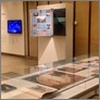 [thumbnail of Installation view, archival maps, cities guides displayed on A1 poster rack and collaborative film work]